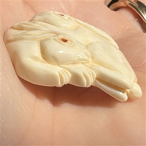 White rabbits Netsuke style natural material button.