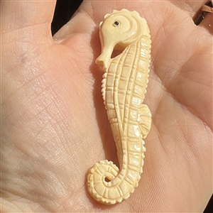 Extra large seahorse Netsuke style natural material button.