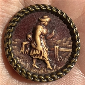 Rare large “Victorian Girl” ivoroid button.