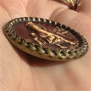 Rare large “Victorian Girl” ivoroid button.
