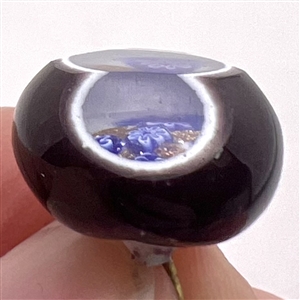 Faceted glass double overlay paperweight “see through” studio button by John Gooderham. 