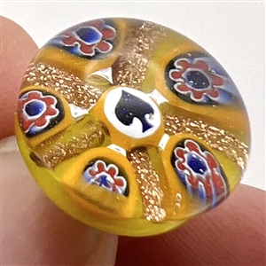 John Gooderham glass paperweight with spade in center studio button.