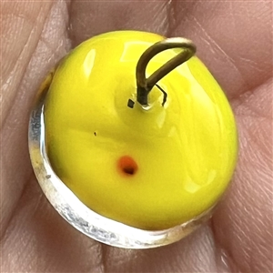John Gooderham glass paperweight with spade in center studio button.