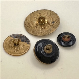 Four fabulous bat buttons.