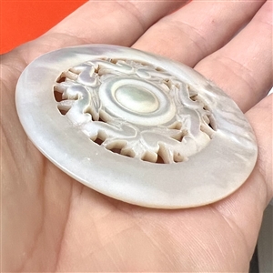 Extra large 19th c. carved and pierced pearl  button.