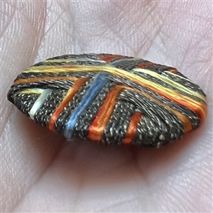 Colorful Death’s head fabric and bullion threads button.