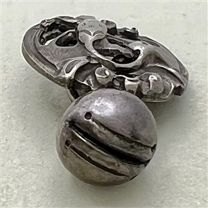 Asian silver toggle button.