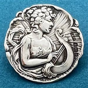 Hallmarked silver button of a “muse of music.