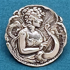 Hallmarked silver button of a “muse of music.