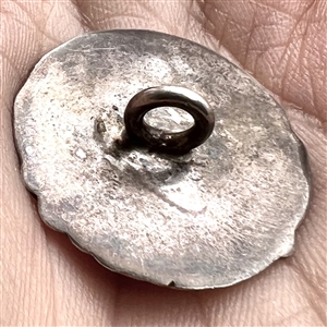 Hallmarked silver button of a “muse of music.