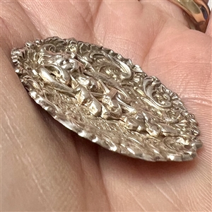 White metal lion “door knocker button.