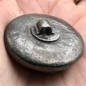 Metalized molded plastic button of a cherry.