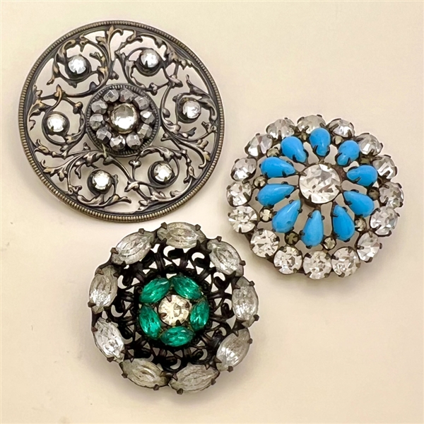 Three jewel buttons.