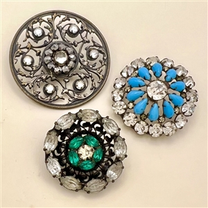 Three jewel buttons.