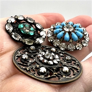 Three jewel buttons.