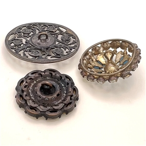 Three jewel buttons.