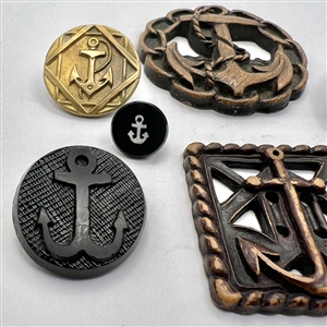 Seven assorted anchor buttons.