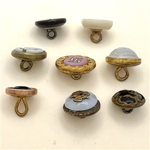Eight weskit buttons. 