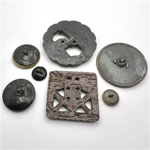 Seven assorted anchor buttons.