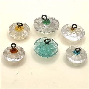 Six glass radiant buttons. 