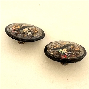 Two exquisite watch crystal buttons. 