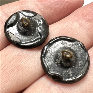 Two exquisite watch crystal buttons. 