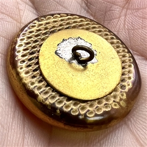 Bimini button of a horse's head.