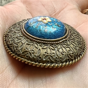 A 19th c. Basse-taille enamel button of a flower.