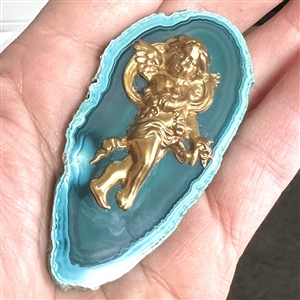 Extra large gemstone button with cherub.