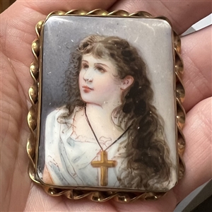 Extra large religious button of girl with cross necklace.