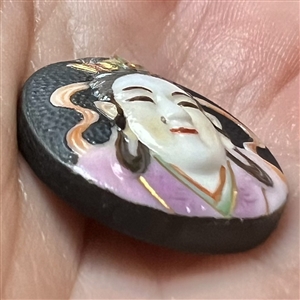 Arita porcelain button of “Benzaiten.”