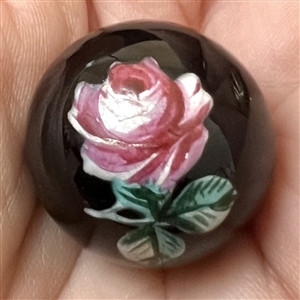 Ceramic ball button with painted rose.