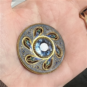 Gorgeous 19th c. enamel button with see through blue faceted glass jewel.