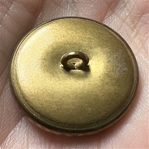 Sulphide (?) head of a woman - glass in metal button.