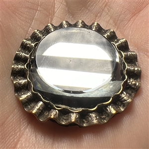 A 19th c. Glass in metal button.
