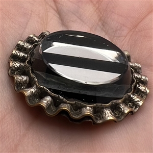 A 19th c. Glass in metal button.