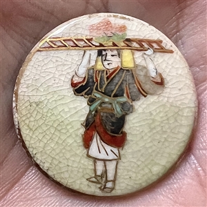 Japanese Satsuma button of a woman street vendor from Ohara.