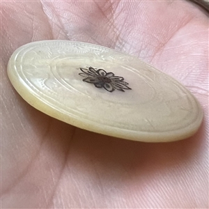 Early 19th c. Incised pearl button with brass center.