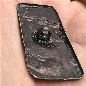 Japanese Shakudo button of a crane standing in a stream.