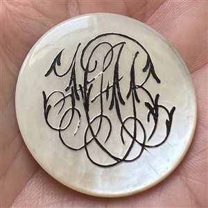 Livery monogram pearl button.