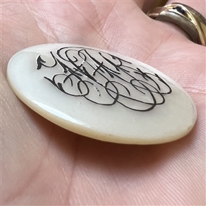 Livery monogram pearl button.