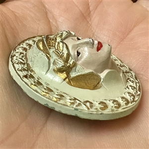 “Lady Liberty” Vintage painted plastic button.