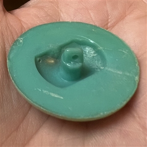 “Lady Liberty” Vintage painted plastic button.