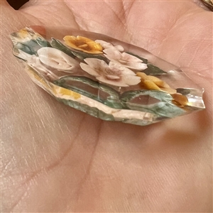Large reverse-carved acrylic flowers.