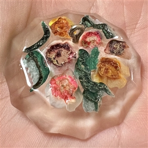Large reverse-carved acrylic flowers.