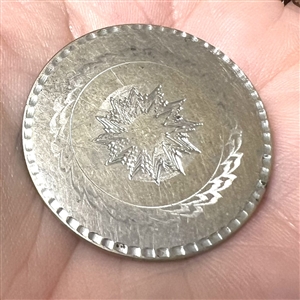 An 18th c. Tombac button of sun burst and borders.