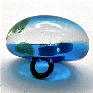 Glass paperweight studio button of flowers.