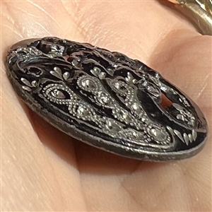 Bright cut Pewter button with a Lion rampant.