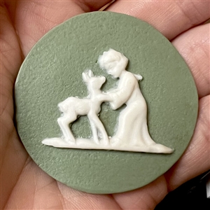 Jasperware studio button of robed child and deer by Shirley Shaw.