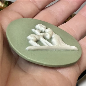 Jasperware studio button of robed child and deer by Shirley Shaw.
